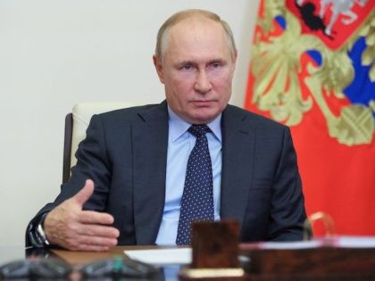 Russian President Vladimir Putin speaks with Russia's local authorities during a vide