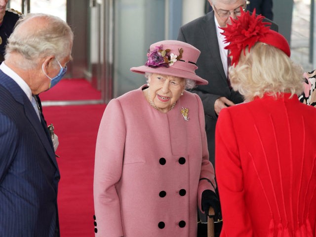 Britain's Queen Elizabeth II (C), Britain's Prince Charles, Prince of Wales (L) and Britain's Camilla, Duchess of Cornwall (R) attend the ceremonial opening of the sixth Senedd, the Welsh Parliament, in Cardiff, Wales on October 14, 2021. (Photo by Jacob King / POOL / AFP) (Photo by JACOB KING/POOL/AFP via …
