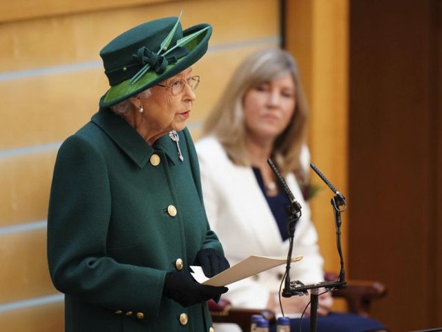 Britain's Queen Elizabeth II delivers her speech in the debating chamber to mark the offic