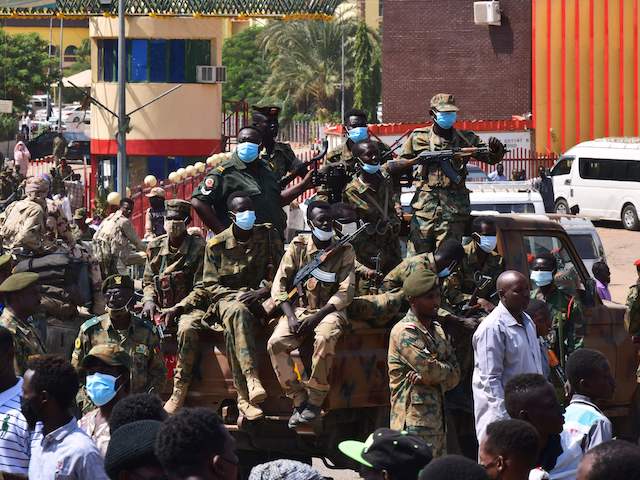 Sudanese security forces keep watch as they protect a military hospital and government offices during protests against a military coup overthrowing the transition to civilian rule on October 25, 2021 in the capital's twin city of Omdurman. (AFP via Getty Images)