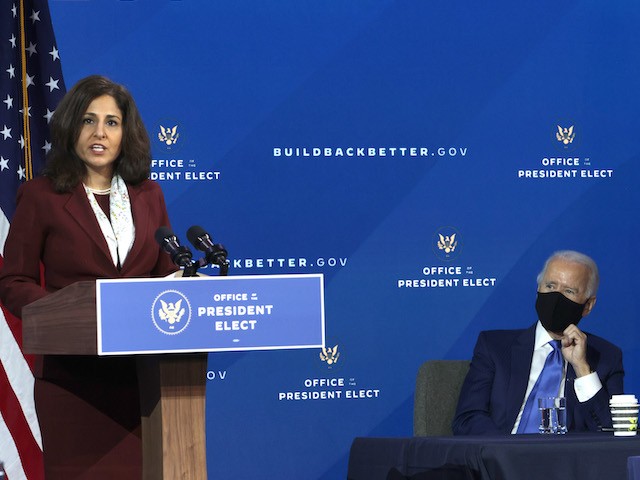 Director of the Office of Management and Budget nominee Neera Tanden (L) speaks as President-elect Joe Biden (R) looks on during an event to name President-elect Joe Biden’s economic team at the Queen Theater on December 1, 2020 in Wilmington, Delaware. (Alex Wong/Getty Images)