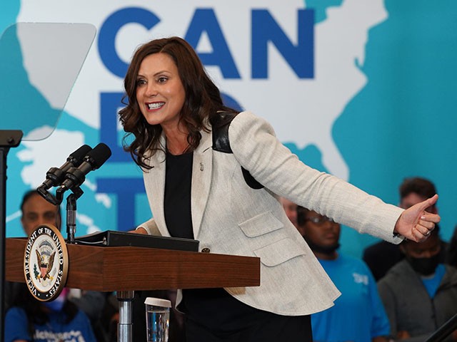 Michigan Gov. Gretchen Whitmer speaks before Vice President Kamala Harris takes the stage to speak with people during a vaccine mobilization event at the TCF Center in Detroit on July 12.