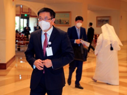China's special envoy to Afghanistan, Yue Xiaoying, left, arrives for talks to see how to restart Afghan-Taliban talks and halt the Taliban onslaught, in Doha, Qatar, Tuesday, Aug. 10, 2021. On Tuesday, Zalmay Khalilzad, a U.S. peace envoy brought a warning to the Taliban that any government that comes to …