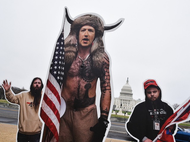 An effigy of Facebook CEO, Mark Zuckerberg (C), dressed as a January 6, 2021, insurrectionist is placed near the US Capitol in Washington, DC, on March 25, 2021. (Mandel Ngan/AFP via Getty Images)