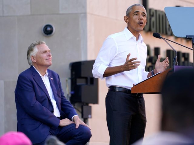 Former President Barack Obama, right, speaks during a rally with Democratic gubernatorial candidate, former Virginia Gov. Terry McAuliffe, left, in Richmond, Va., Saturday, Oct. 23, 2021. McAuliffe will face Republican Glenn Youngkin in the November election. (AP Photo/Steve Helber)
