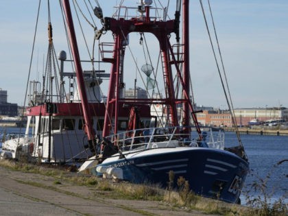 The British trawler kept by French authorities docks at the port in Le Havre, western France, Thursday, Oct. 28, 2021. French authorities fined two British fishing vessels and kept one in port overnight Thursday Oct.28, 2021 amid a worsening dispute over fishing licenses that has stoked tensions following the U.K.'s …