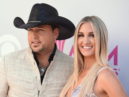 Jason Aldean, left, and Brittany Kerr arrive at the 52nd annual Academy of Country Music A