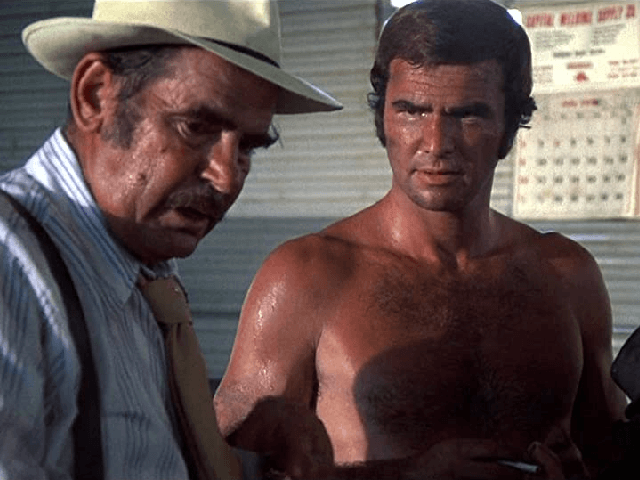 Burt Reynolds and Lincoln Demyan in White Lightning (1973)