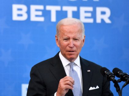 US President Joe Biden speaks after touring the Electric City Trolley Museum as he promote