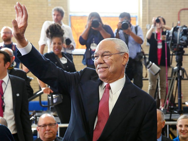 Former US Secretary of State Colin Powell waves before arrival of President Barack Obama at Benjamin Banneker Academic High School in Washington,DC on October 17, 2016. / AFP / YURI GRIPAS (Photo credit should read YURI GRIPAS/AFP via Getty Images)