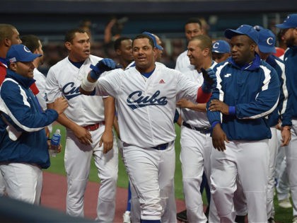 Yosvany Alarcon (C) of Cuba celebrates victory with his teammates after the WBSC Premier 12 Opening Round group C baseball game between Cuba and Australia at Gocheok Sky Dome in Seoul on November 7, 2019. (Photo by Jung Yeon-je / AFP) (Photo by JUNG YEON-JE/AFP via Getty Images)