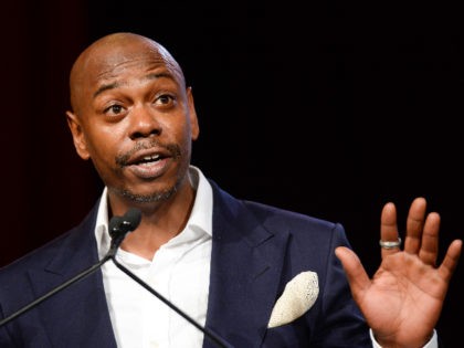 Comedian Dave Chappelle speaks on stage at the RUSH Philanthropic Arts Foundation’s Art
