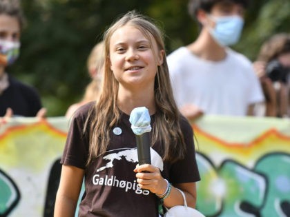 MILAN, ITALY - OCTOBER 01: Greta Thunberg speaks during the climate strike march on October 1, 2021 in Milan, Italy. On the sidelines of various pre-COP26 summits on the topic of climate change and climate finance, students, young activists and civil society march for action against climate change. (Photo by …