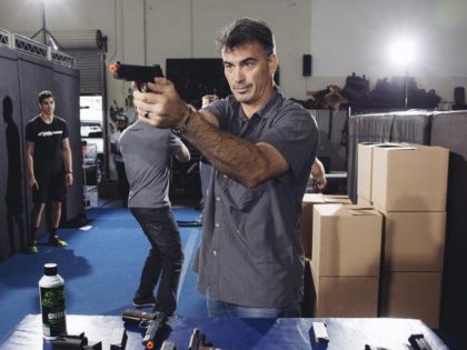 FILE - In this Oct. 7, 2014 photo, Chad Stahelski, co-director of the film, "John Wick," demonstrates proper gun handling during a training session at 87Eleven Action Design in Inglewood, Calif. Guns used in making movies are sometimes real weapons that can fire either bullets or blanks, which are gunpowder …