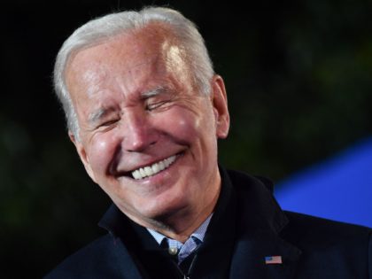 US President Joe Biden smiles as he speaks during a campaign event for Virginia Democratic
