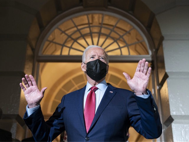 FILE - In this Oct. 1, 2021, file photo President Joe Biden speaks with reporters as he departs after a House Democratic Caucus meeting on Capitol Hill in Washington. (AP Photo/Alex Brandon, File)