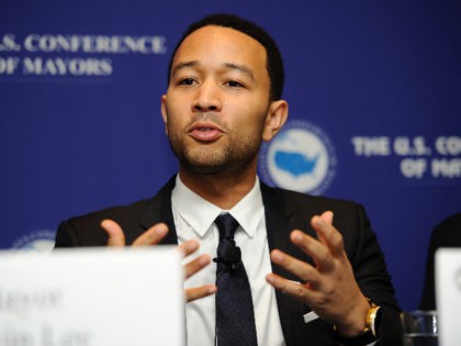 IMAGE DISTRIBUTED FOR EA - Musician John Legend speaks on STEM education and the announcement of SimCity EDU by EA Maxis at National Conference of Mayors, Friday, Jan. 18, 2013, in Washington. (Photo/Nick Wass/Invision for EA)