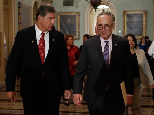 Sen. Joe Manchin, D-W.Va., left, and Senate Minority Leader Charles Schumer, D-N.Y. arrive for a news conference on Capitol Hill in Washington, Tuesday, May 2, 2017. (AP Photo/Carolyn Kaster)