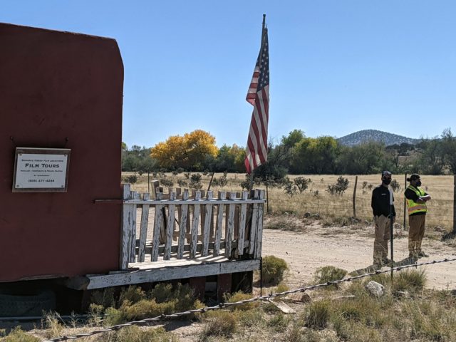 TOPSHOT - Security guards stand at the entrance of Bonanza Creek Ranch in Santa Fe, New Me