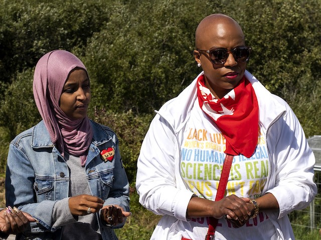 Rep. Ilhan Omar (D-MN) and Rep. Ayanna Pressley (D-MA) are pictured near the headwaters of the Mississippi River where the Line 3 Pipeline is being constructed on September 4, 2021 in Park Rapids, Minnesota. (Stephen Maturen/Getty Images)