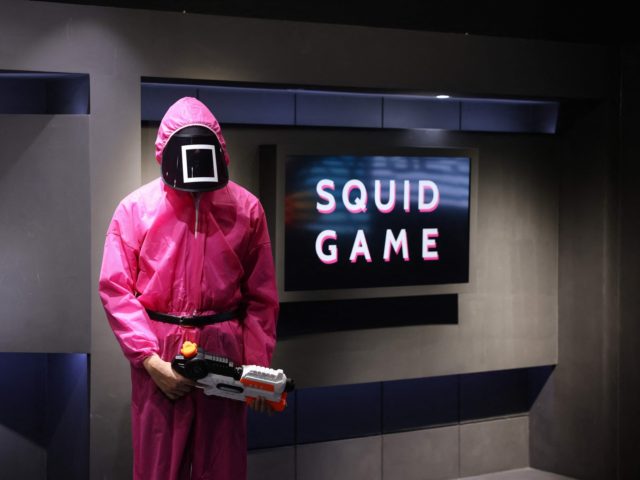 Participants take part in an event where they play the games of Netflix smash hit "Squid G
