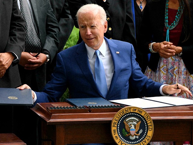US President Joe Biden looks on after signing three proclamations restoring protections stripped by the Trump administration for Bears Ears, Grand Staircase-Escalante, and Northeast Canyons and Seamounts national monuments, on the North Lawn of the White House on October 8, 2021 in Washington, DC. (Photo by Olivier DOULIERY / AFP) (Photo by OLIVIER DOULIERY/AFP via Getty Images)