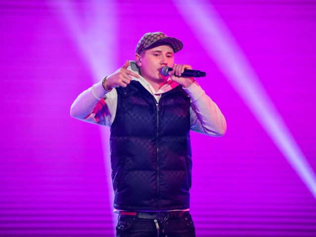 A picture taken on September 27, 2019 in Stockholm shows the Swedish rap artist Einar performing on stage. - A person believed to be the Swedish rap artist Einar, officially named Nils Kurt Erik Einar Gronberg, was shot to death in the street at the Hammarby Sjostad district in Stockholm …