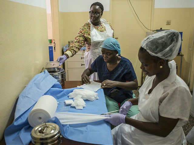 Gauze is prepared ahead of sterilisation at the maternity ward of the Princess Christian Maternity Hospital in Freetown on April 25, 2016. With the head nurse of the hospital as her sole guardian Isatu will have to face the complications of an early pregnancy and the difficulties of a complex …