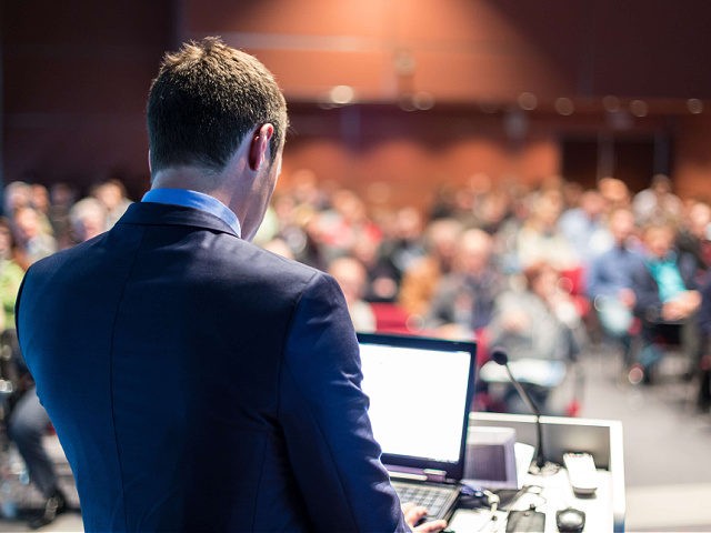 Public speaker giving talk at business event. - stock photo