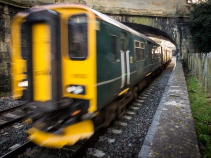 BATH, ENGLAND - FEBRUARY 19: A train leaves Bath Spa station on the Great Western railway line on February 19, 2016 in Bath, England. The electrification of the route and the replacement of the ageing diesel powered rolling stock, some of which dates back to the nationalised British Rail era …