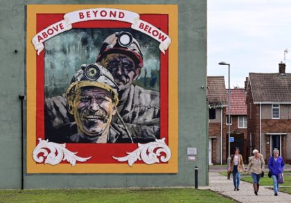 Landmarks around Seaham like a mural by artist Cosmo Sarson remind of the town's coal-mini