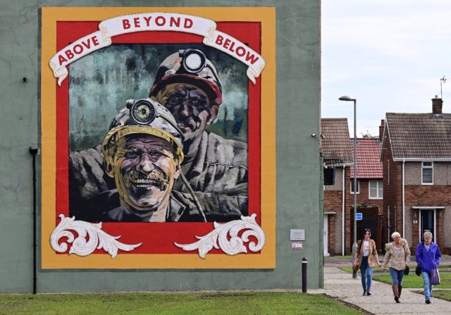 Landmarks around Seaham like a mural by artist Cosmo Sarson remind of the town's coal-mini