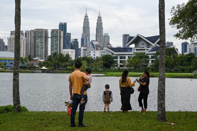 Malaysia eased domestic and international travel curbs for those fully vaccinated against