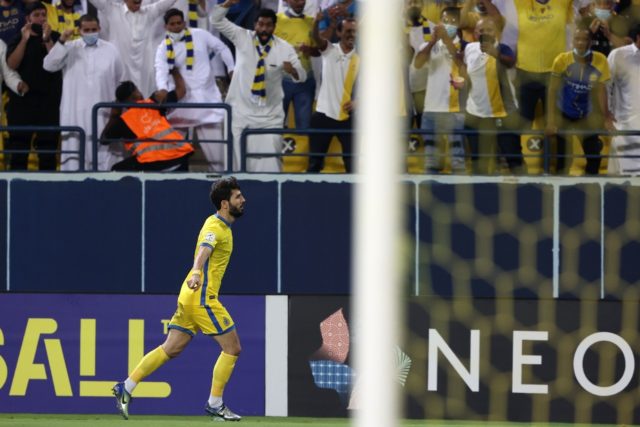 Double up: Al Nassr's Jaloliddin Masharipov celebrates one of his goals