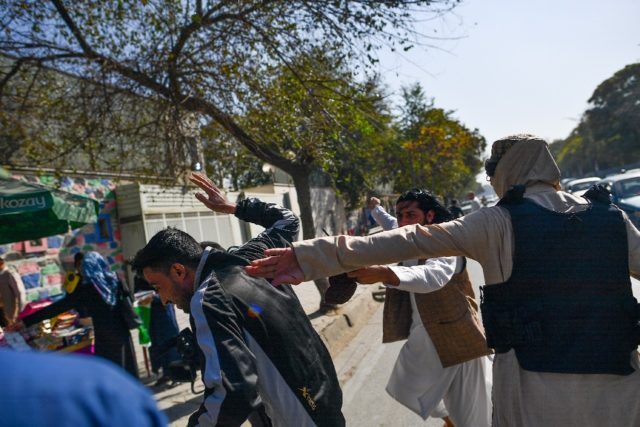 The Taliban struck several journalists to prevent media coverage of a women's rights prote