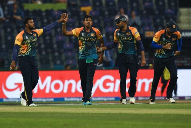 Man of mystery: Sri Lanka spinner Maheesh Theekshana (second left) celebrate after taking