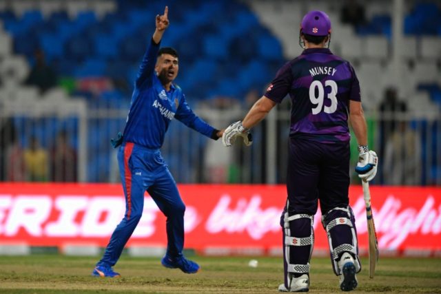 Afghanistan's Mujeeb Ur Rahman (L) took five wickets in a 130-run defeat of Scotland