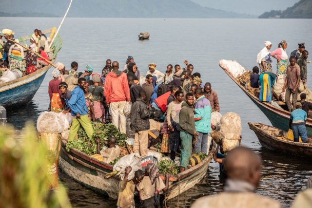 Goma and Bukavu, present a daily ballet of large motorised canoes crammed with people and