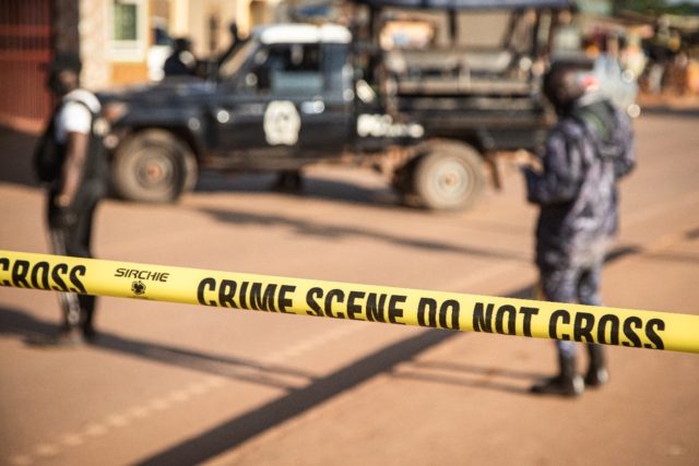 Ugandan police secure the site of a deadly bombing Saturday in the capital Kampala.