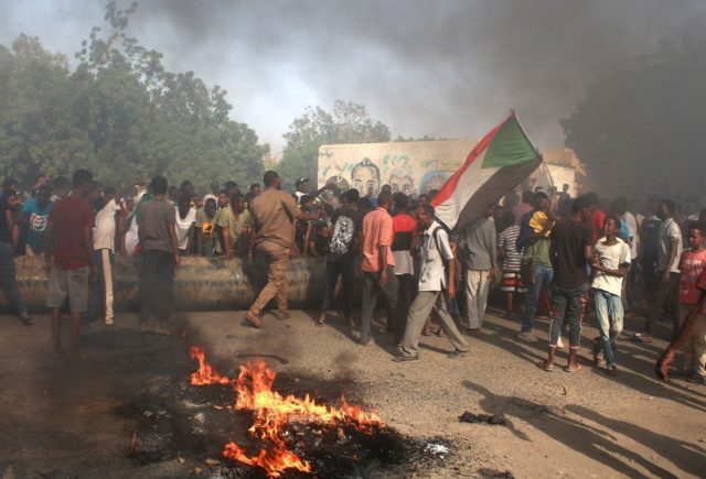 Washington said it was pausing US aid to Sudan after a military takeover in the African na