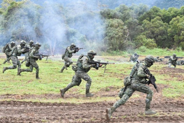 Taiwanese soldiers practice staging an attack during an annual drill in 2018 at a military base in the eastern city of Hualien