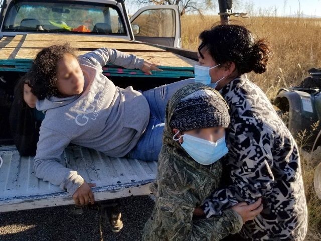 Tucson Station Border Patrol agents found a group of ten migrants, including three children, trapped under a load of plywood in a pickup truck bed. (Photo: U.S. Border Patrol/Tucson Sector)