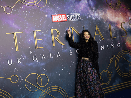 Director Chloe Zhao poses for photographers upon arrival at the premiere of the film 'Eternals' on Wednesday, Oct. 27, 2021 in London. (Photo by Vianney Le Caer/Invision/AP)