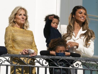 First lady Jill Biden, singer and wife of Seattle Seahawks quarterback Russell Wilson, Ciara Princess Wilson, right, with her children Sienna Princess, 4, and Win Harrison Wilson, 1, watch from the White House balcony as President Joe Biden, leave the White House on Marine One, Wednesday, Nov. 17, 2021, in …