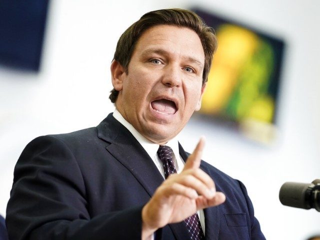 Florida Gov. Ron DeSantis speaks to supporters and members of the media after a bill signing Thursday, Nov. 18, 2021, in Brandon, Fla. DeSantis signed a bill that protects employees and their families from coronavirus vaccine and mask mandates. (AP Photo/Chris O'Meara)