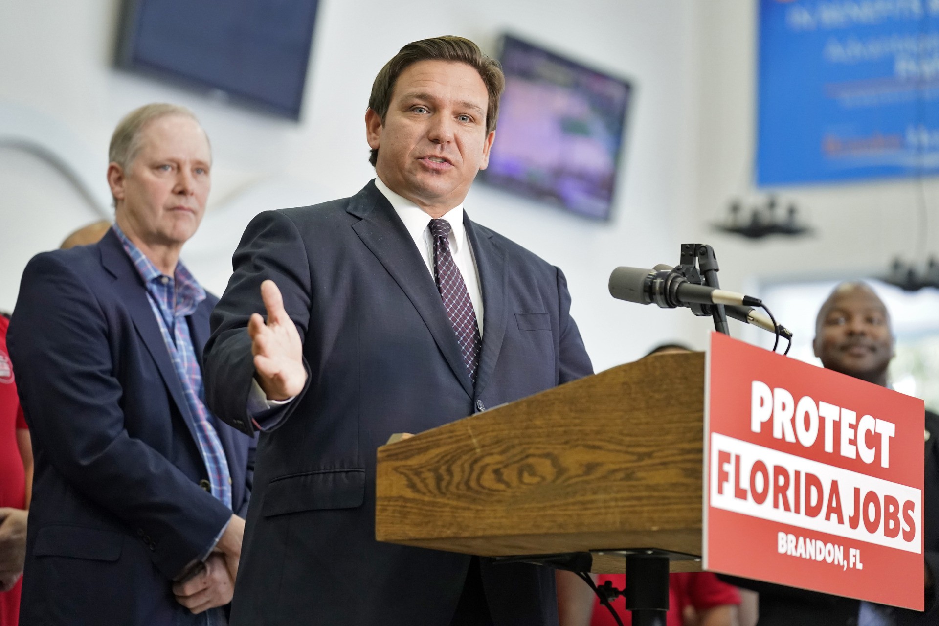 Florida Gov. Ron DeSantis speaks to supporters and members of the media after a bill signing Thursday, Nov. 18, 2021, in Brandon, Fla. DeSantis signed a bill that protects employees and their families from coronavirus vaccine and mask mandates.