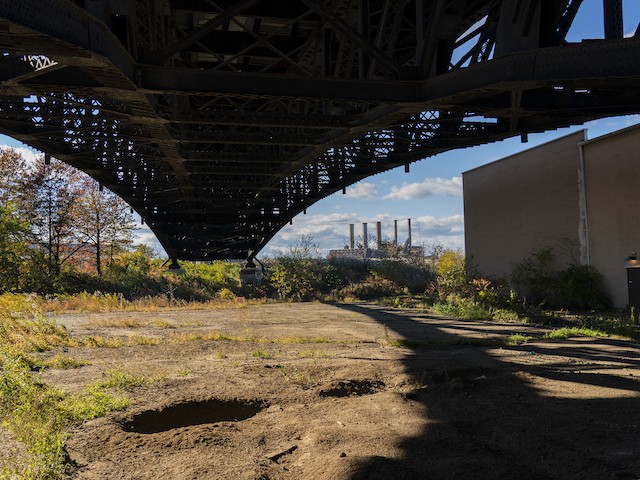The Pulaski Skyway overpasses the site of a former landfill where a new F.B.I. investigation is taking place as a possible location where union boss Jimmy Hoffa is buried, Friday, Nov. 19, 2021, in Jersey City, N.J. The tip came from A worker, on his deathbed, who said he buried the body underground in a steel drum (AP Photo/Corey Sipkin)