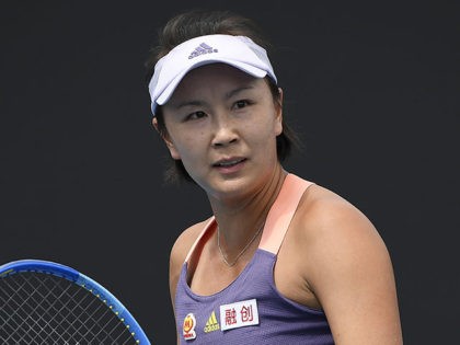 FILE - China's Peng Shuai reacts during her first round singles match against Japan's Nao