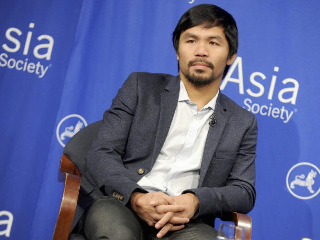 SEPTEMBER 29th 2021: Manny Pacquiao - the only eight-division world champion in the history of professional boxing - announces his retirement. - File Photo by: zz/Dennis Van Tine/STAR MAX/IPx 2015 10/13/15 Manny Pacquiao speaks and takes questions at the Asia Society on the eve of receiving the Asia Game Changer …