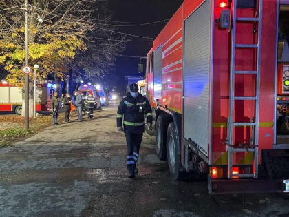 In this image released by Romania's Emergency Situations Inspectorate, firefighters operate on the grounds of a hospital where a fire broke out in Ploiesti, Romania, Thursday, Nov. 11, 2021. According to authorities, two people lost their lives in a fire that broke out in a COVID-19 ward. (Romanian Emergency Situations …